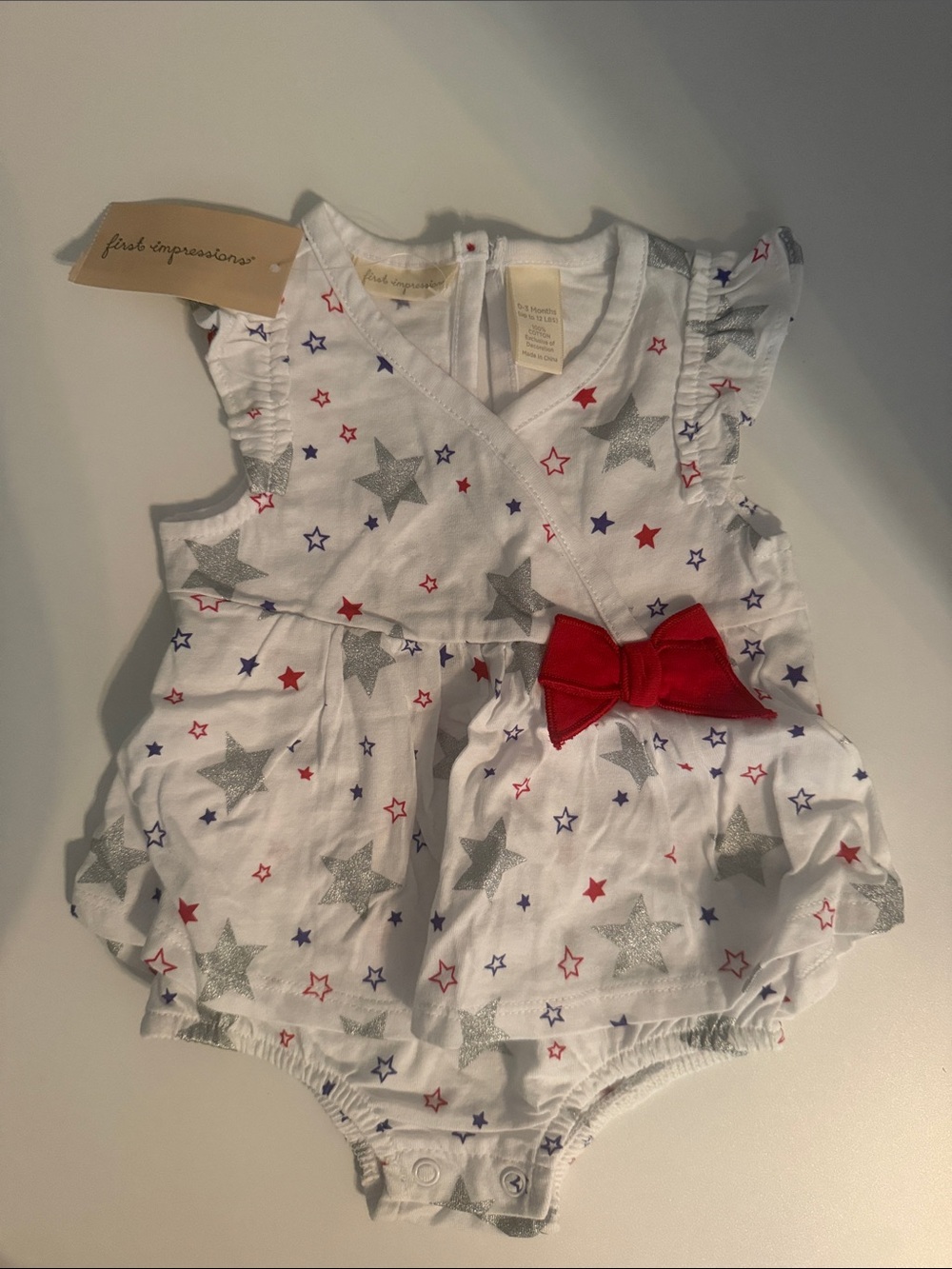 First Impressions White Star-Print Baby Romper with Red Bow Accent